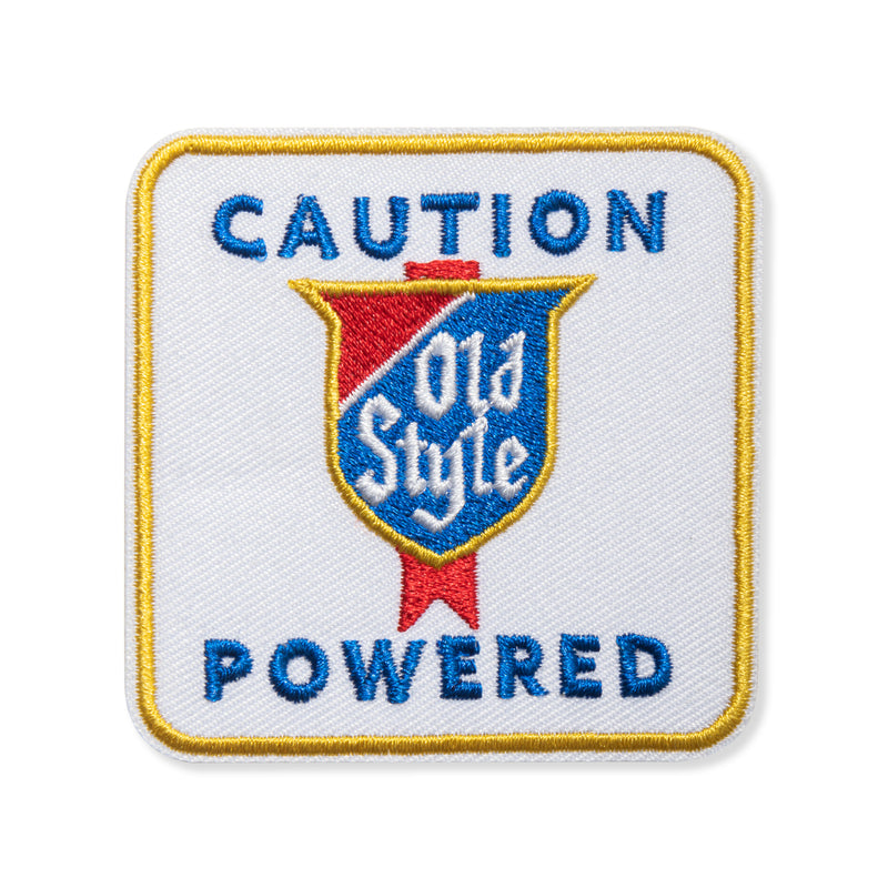 patch with caution powered words and old style logo design 